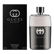 Gucci Guilty Pour Homme perfume bottle and packaging on a white background