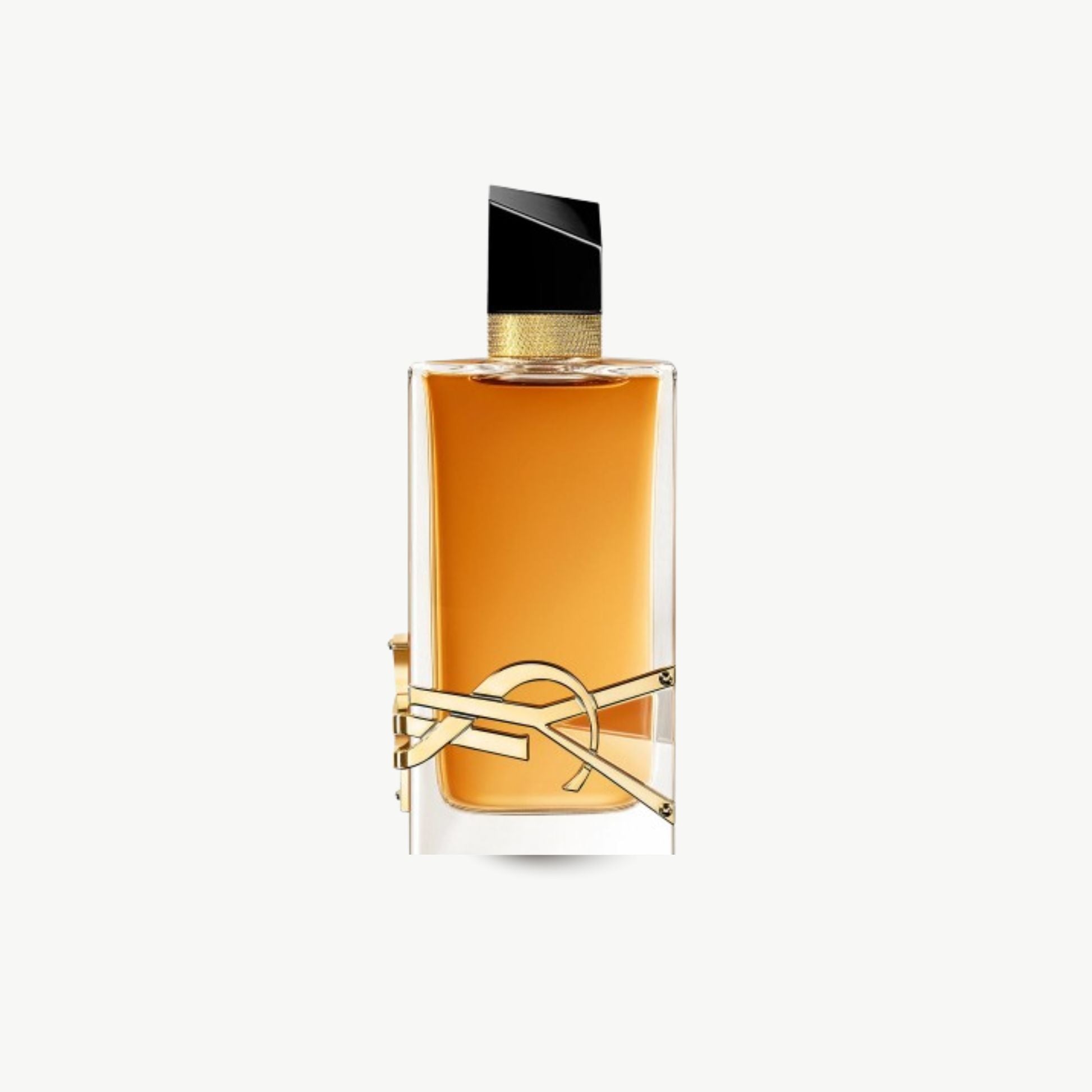 Perfume bottle with gold accents on a white background