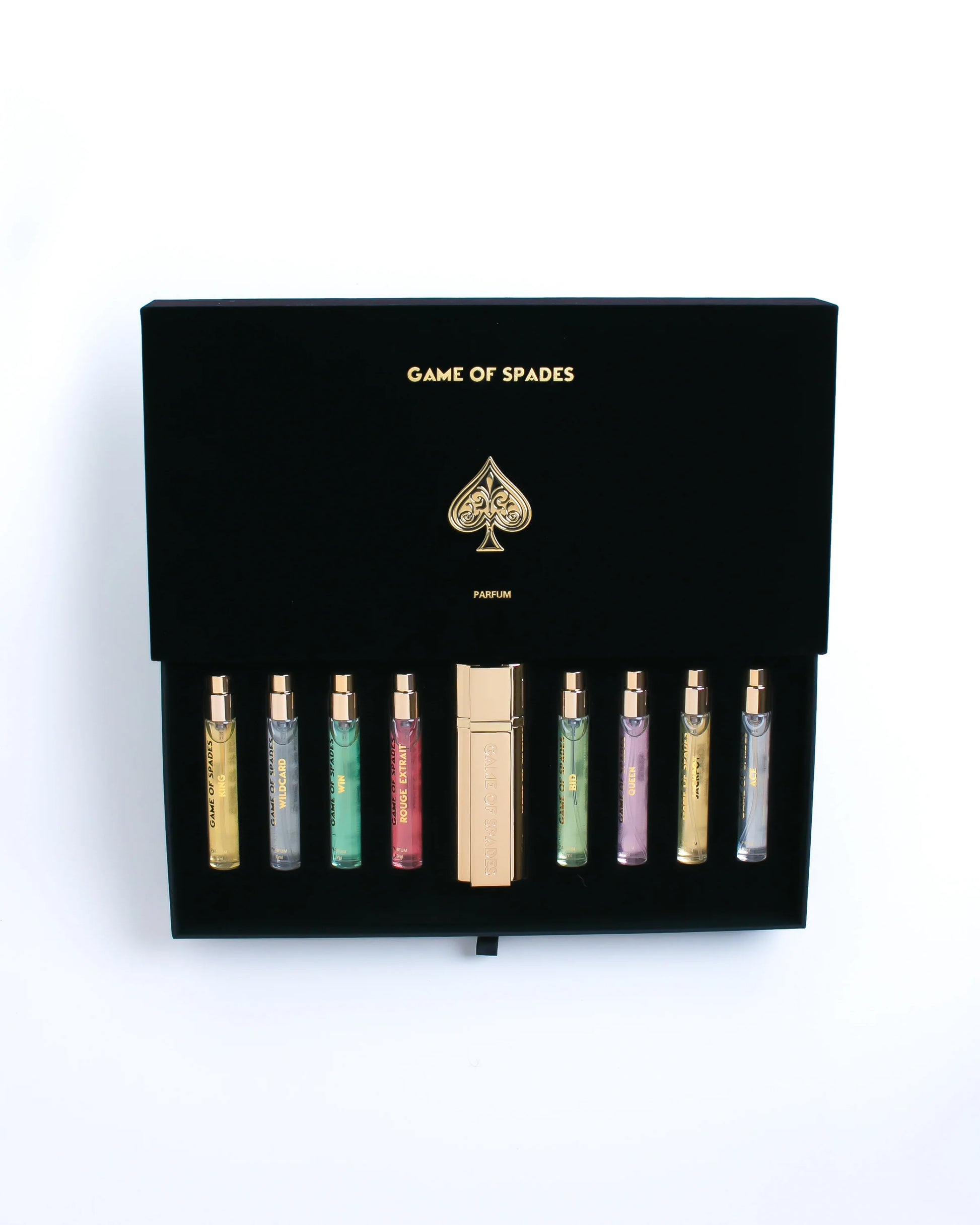 Set of perfume bottles in a black box with 'Game of Spades' branding on a white background